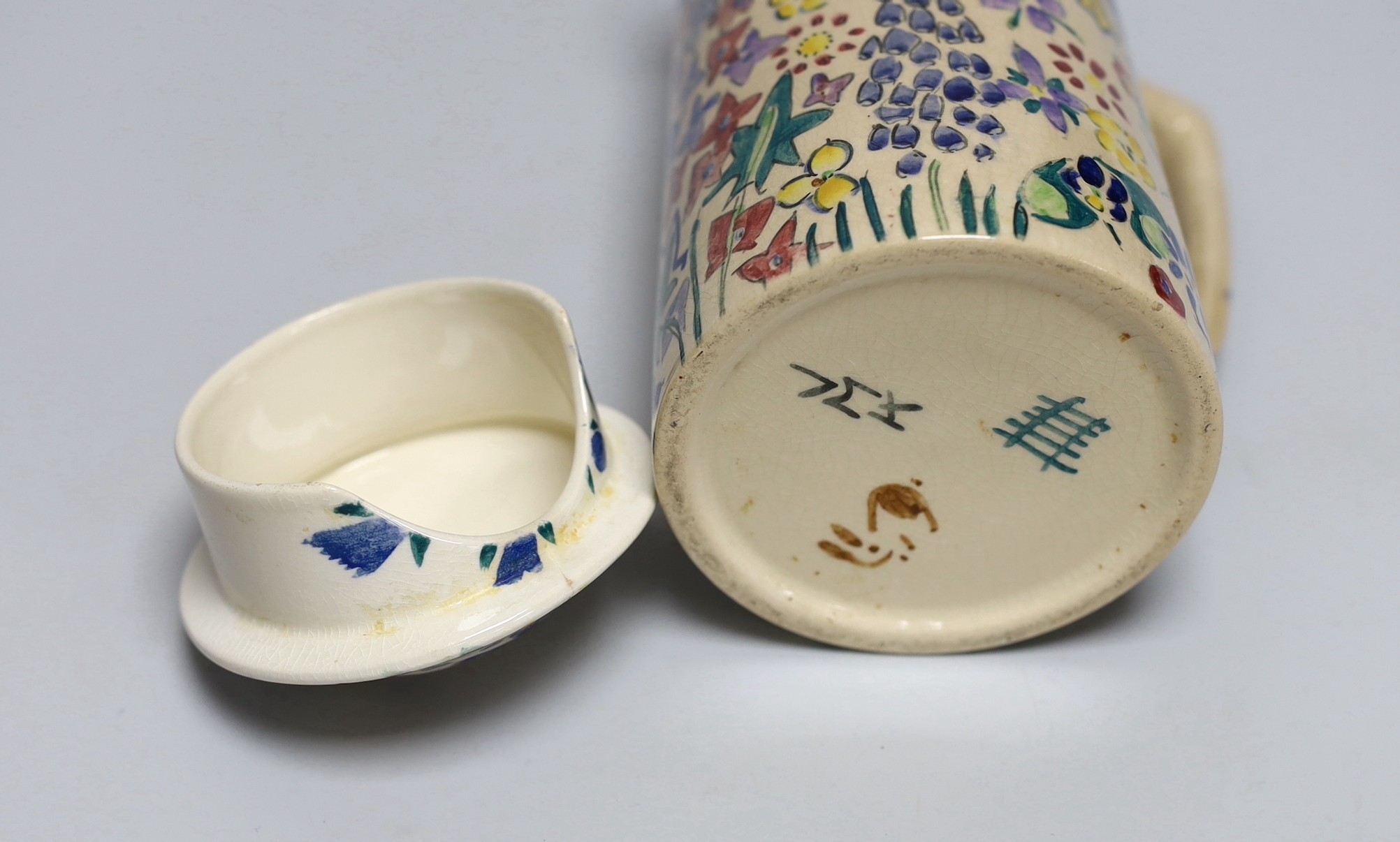 Jessie Marion King (1875-1949), a covered floral jug, 18.5cm